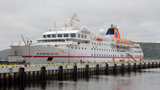 MS Hanseatic moors to a Distant Pier in Murmansk Seaport