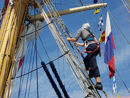Flag of the Russian Federation was raised on the sailing training ship Khersones in honor of the Day of Military Glory of Russia